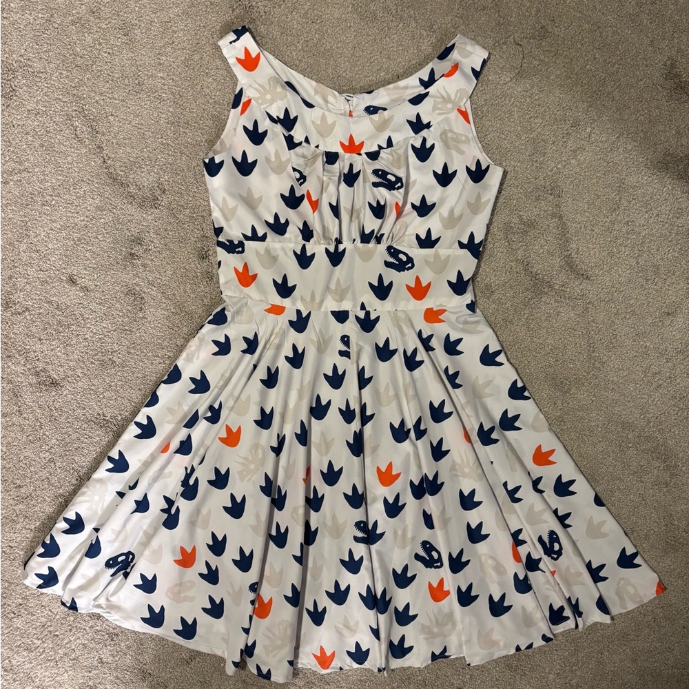 Charming White Dress with Colorful Dinosaur Print